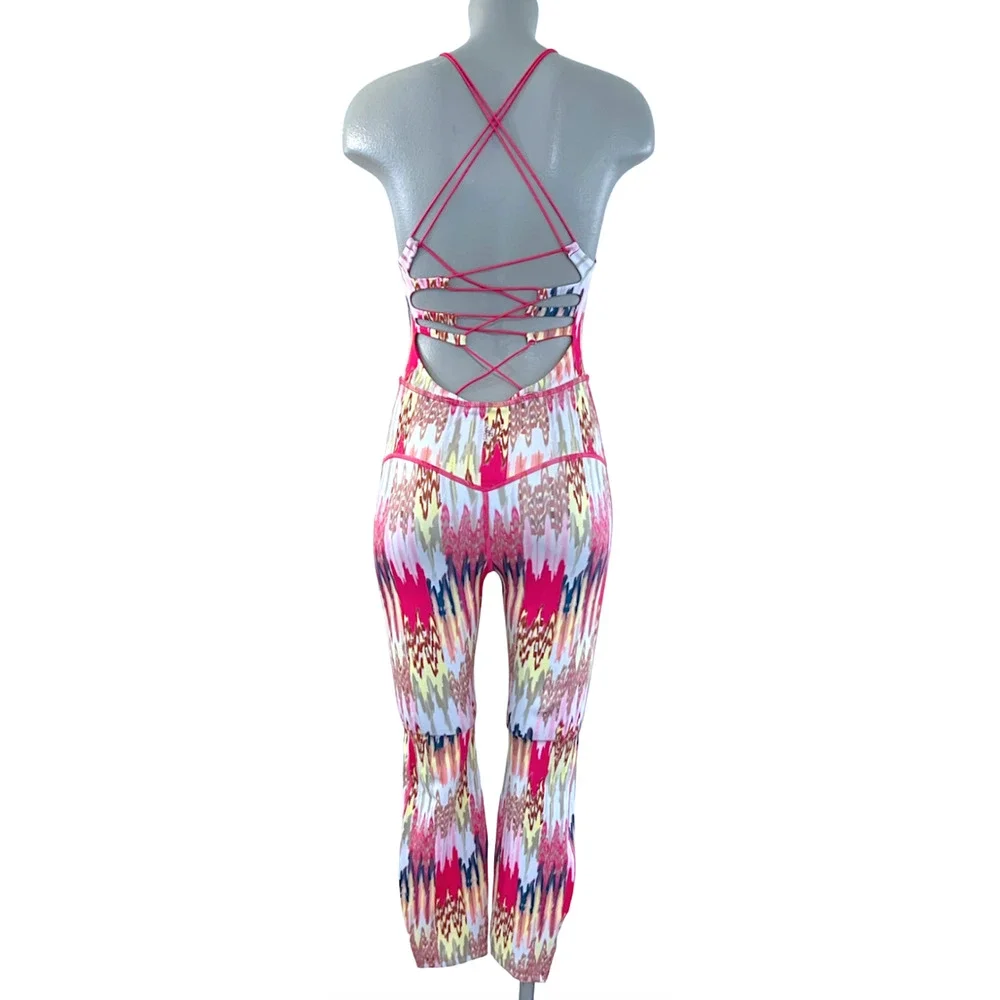 FREE PEOPLE FP MOVEMENT SHE'S GOT RHYTHM PRINTED STRAPPY JUMPSUIT ONE PIECE XS